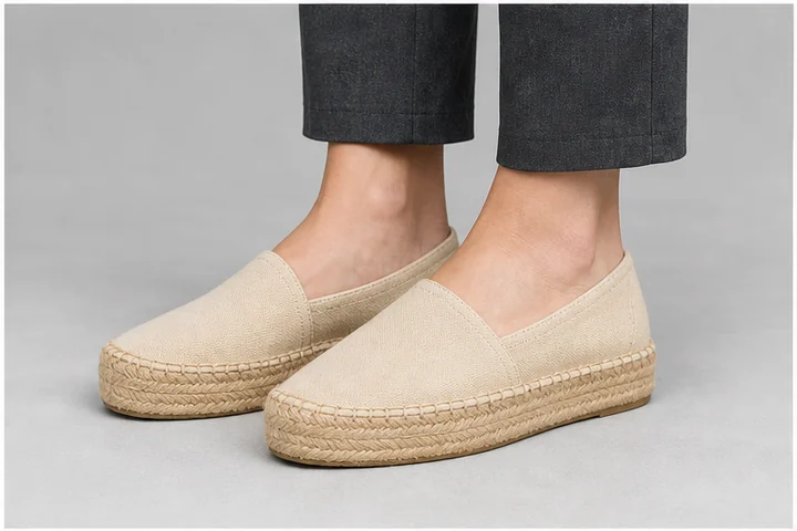 Espadrille — A shoe combining a canvas-like upper with a sole visibly wrapped in braided jute rope.