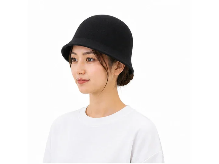 Cloche hat — A close-fitting hat with a bell-shaped crown and a short downward brim.