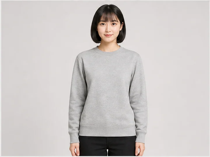スウェットシャツ — 厚手のジャージーとリブの首・袖口・裾を持つ被り式上衣。